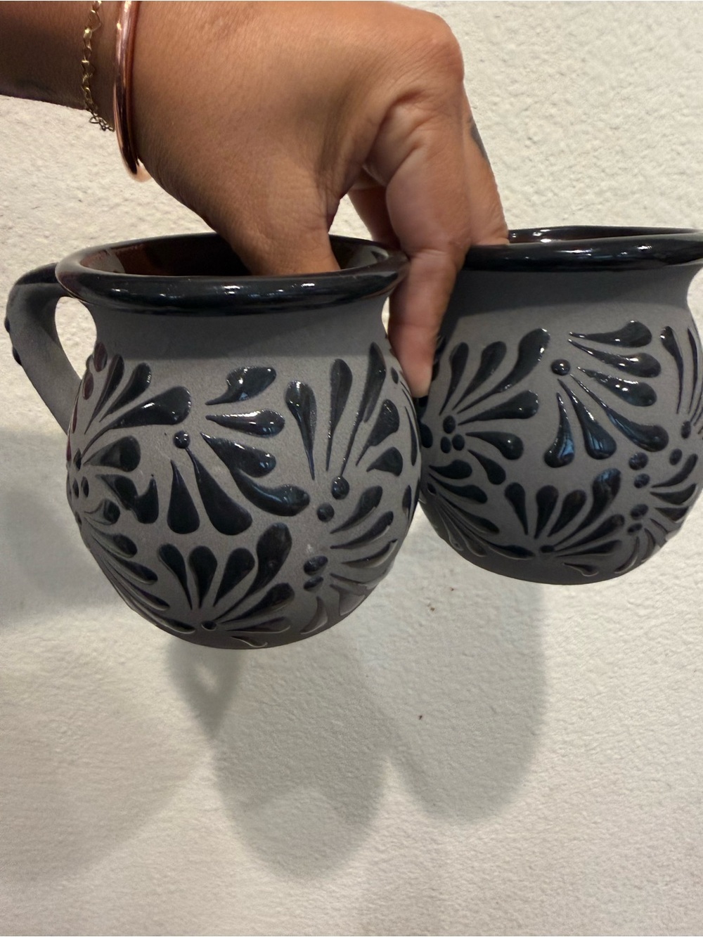 Mexican pottery coffee mugs hand painted black with flower detail
